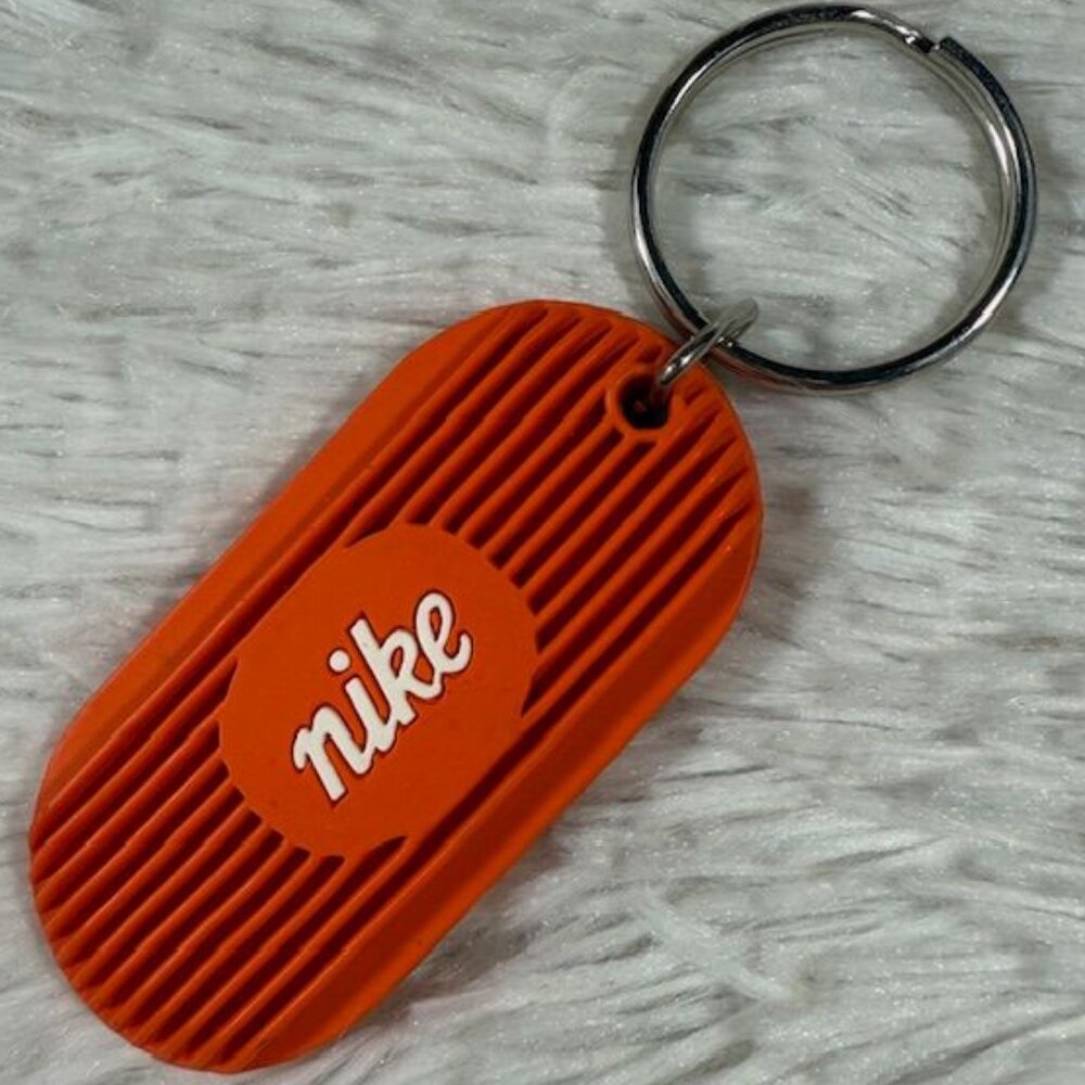 Nike Orange Oval Ribbed Rubber Keychain Bag Charm